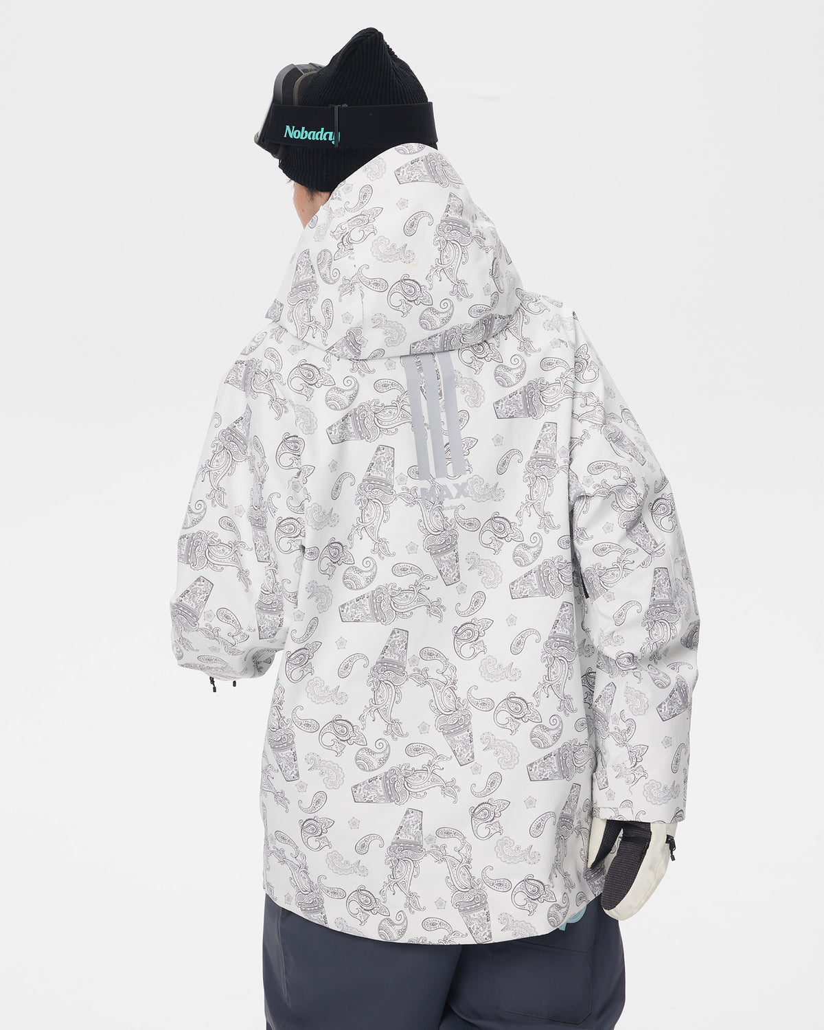 Back view of the white paisley-print Nobaday Dawn Print 3L Zip-Up Snow Jacket showing the hood and rear reflective detail