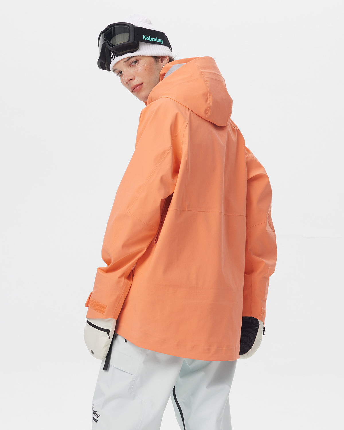 Back view of the Nobaday Men's ArcticStorm Freeride Orange 3L Snow Jacket, featuring the hood and extended rear hem