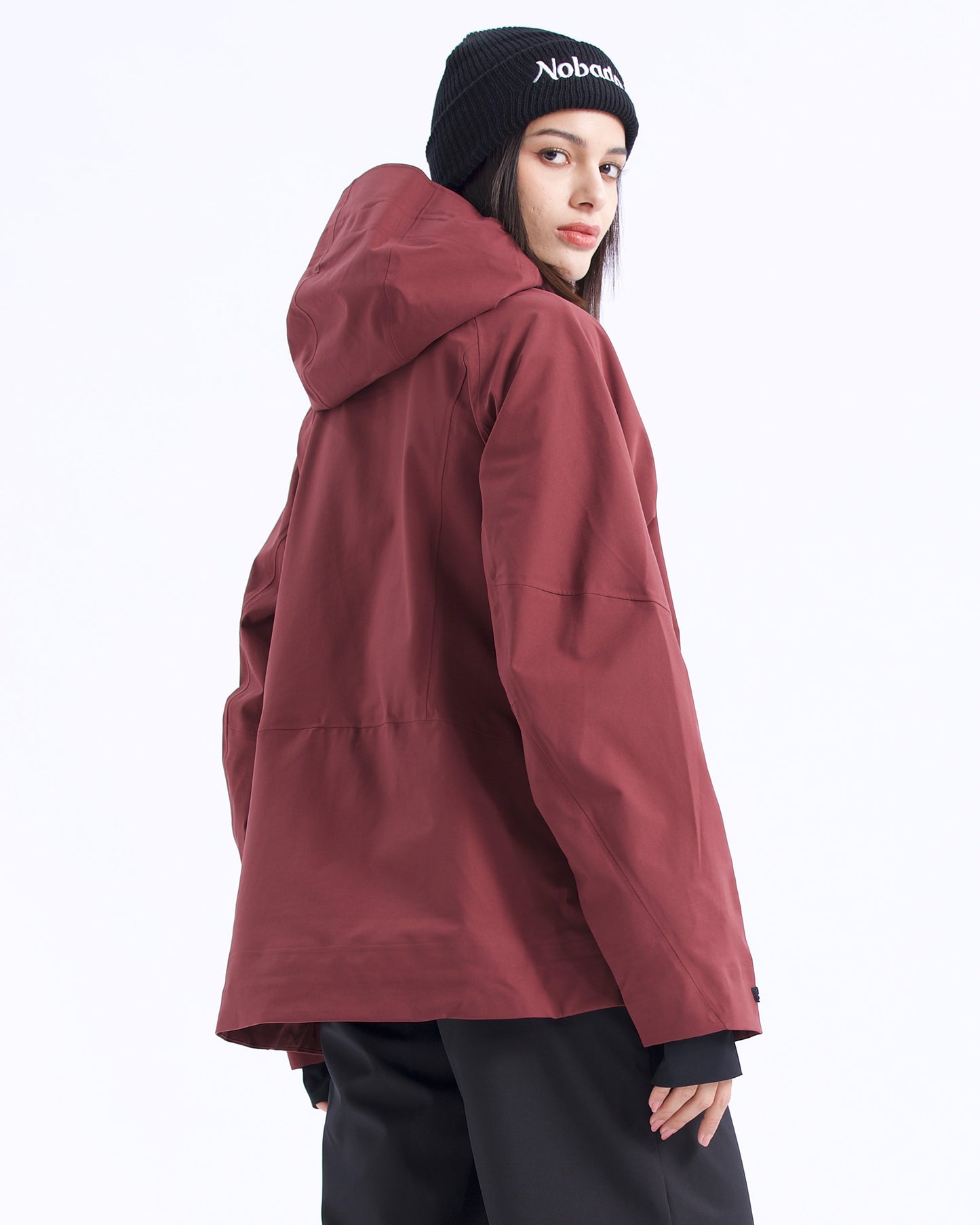 Back view of the NOBADAY Women's Juicy 3L dark red waterproof snow jacket showing the protective hood and clean rear design