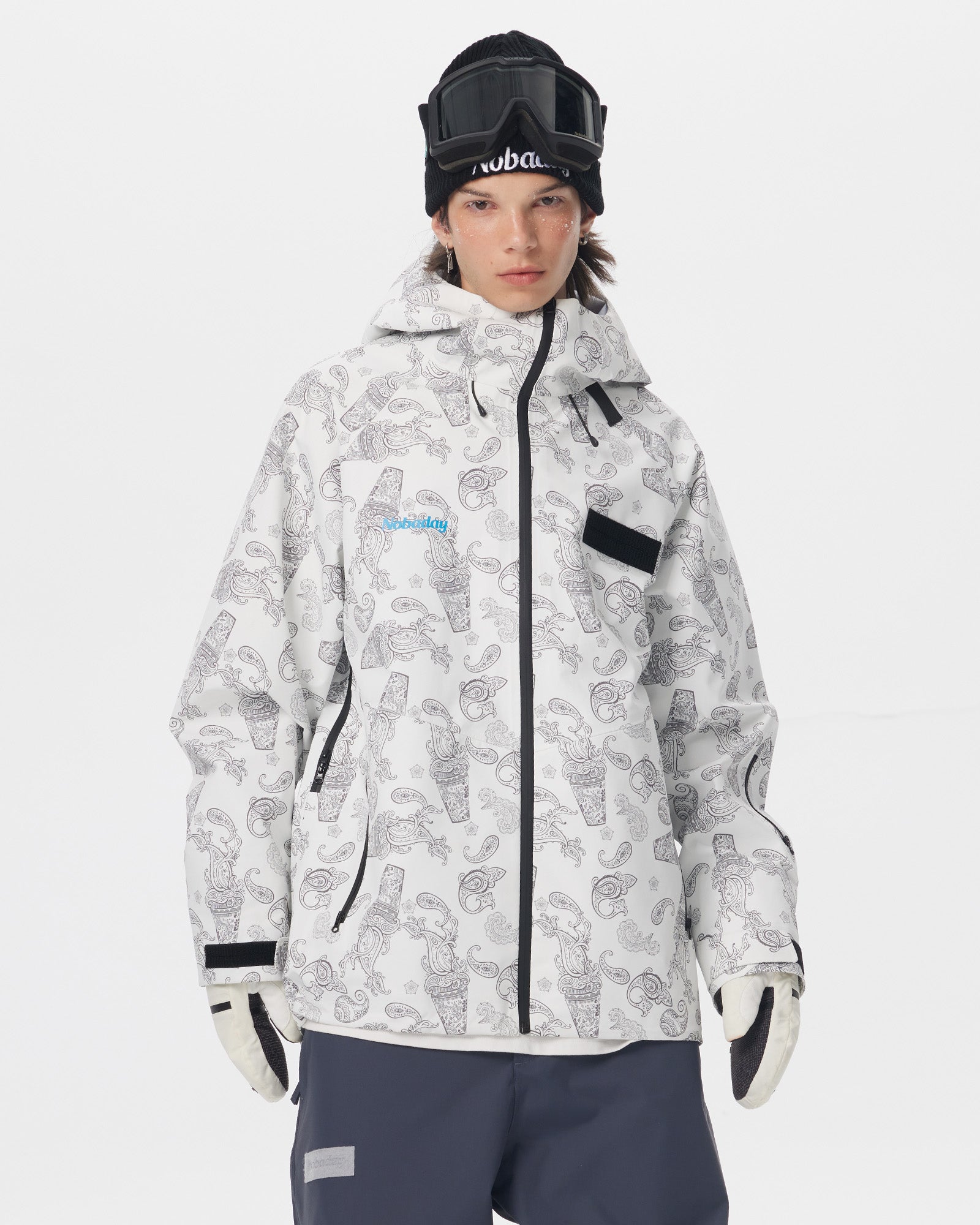 Front view of the white paisley-print Nobaday Dawn Print 3L Zip-Up Snow Jacket with a high collar and hood