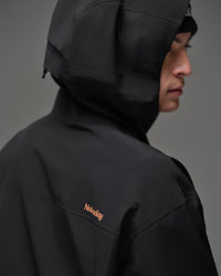 Close-up of the black 3-layer shell fabric and hood on the NOBADAY Apex 3L snow jacket