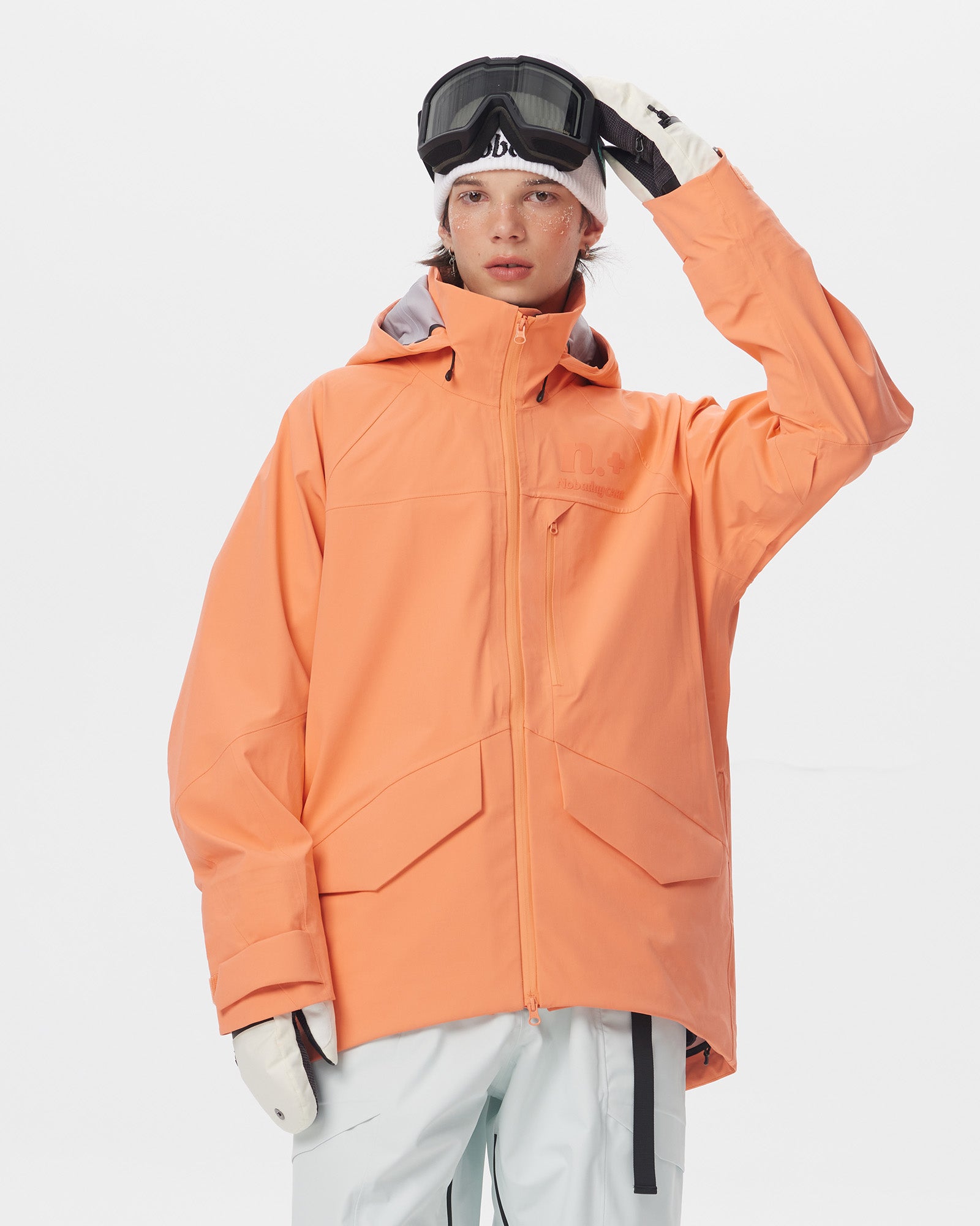 Male model wearing the Nobaday Men's ArcticStorm Freeride Orange Zip-up 3L Snow Jacket in a front view with ski goggles
