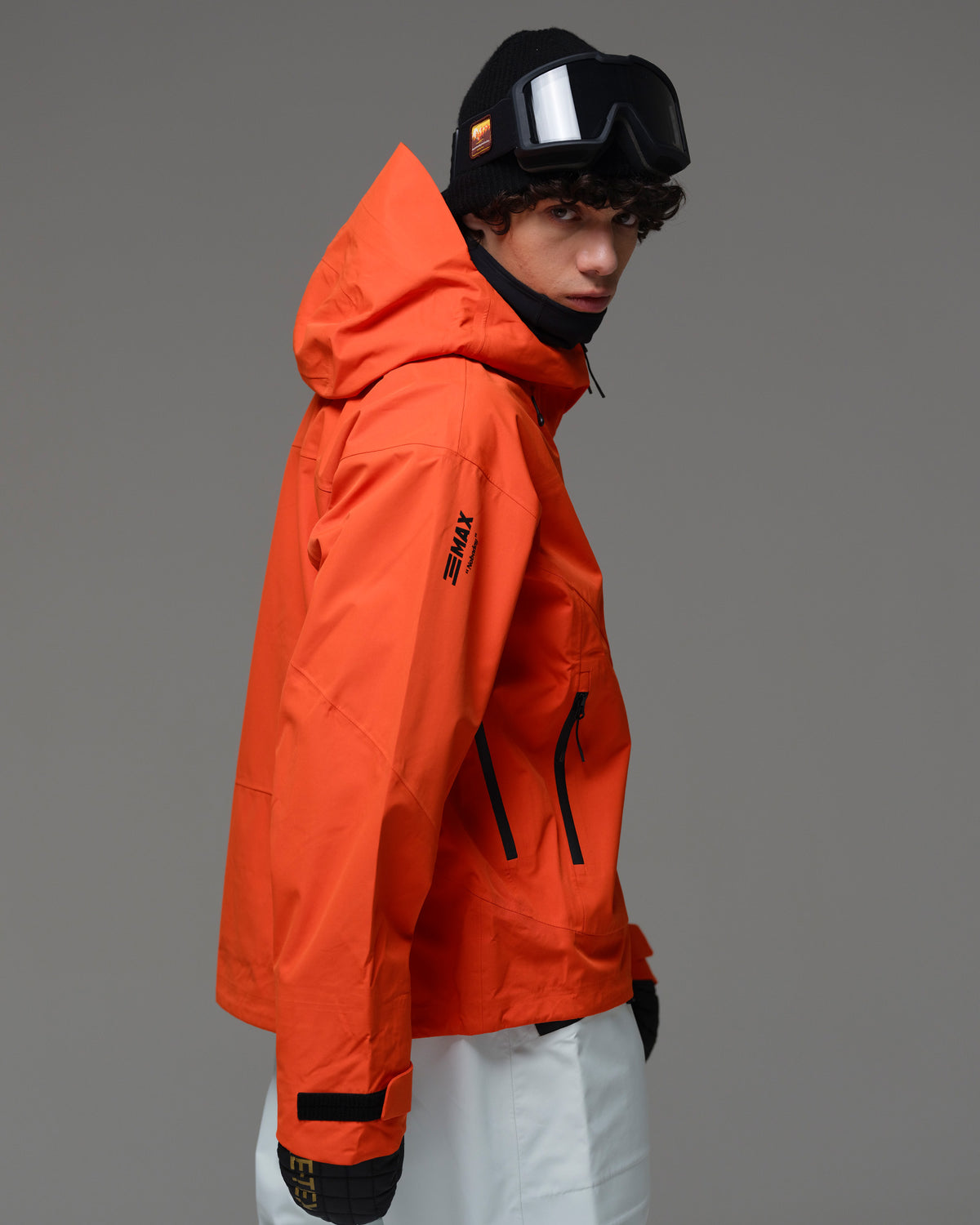 Back view of the NOBADAY Men’s MaxExtreme Pro 3L snow jacket in orange showing the hood and relaxed fit