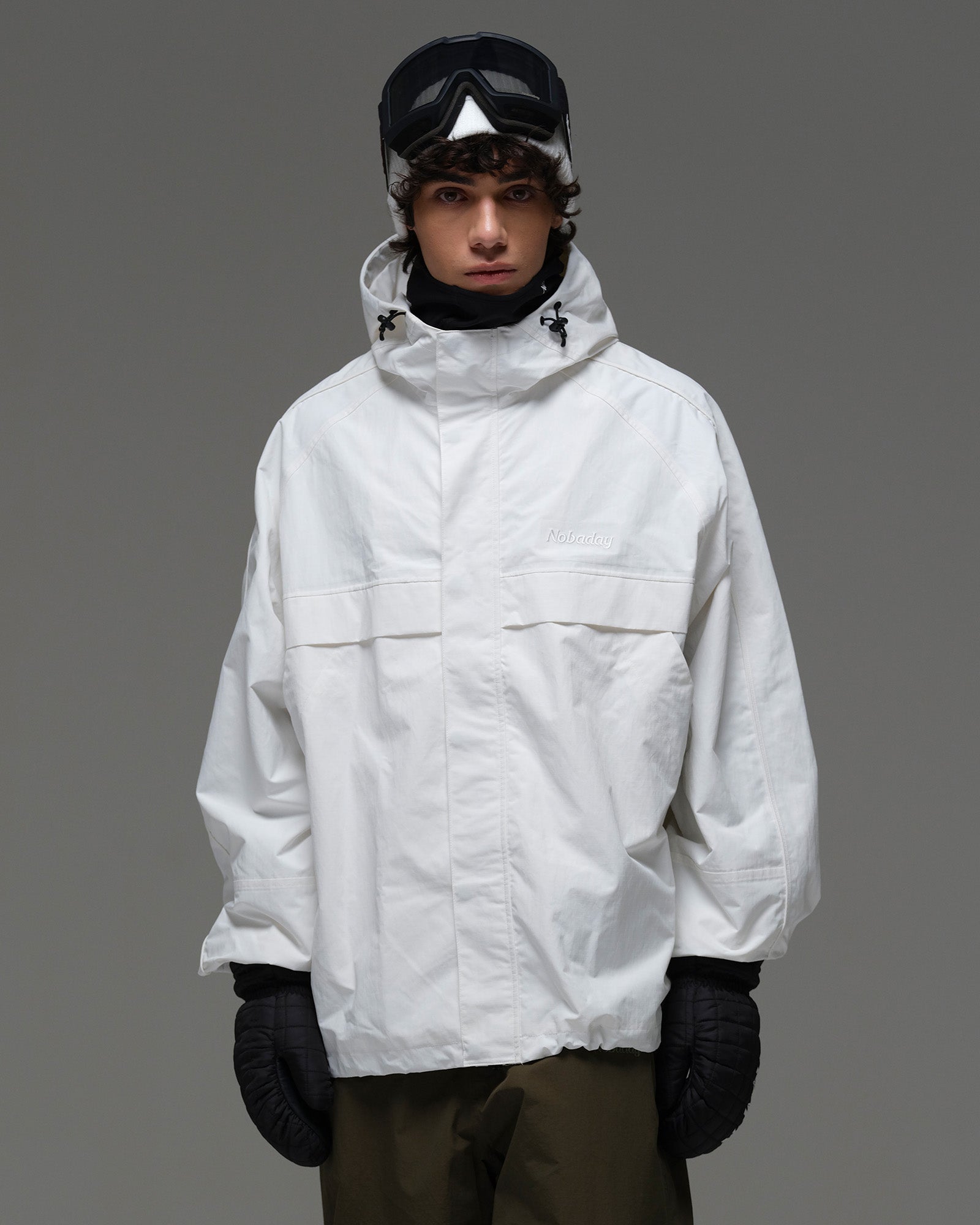 Front view of the white NOBADAY Men’s Pure Free Snow Jacket with an adjustable hood
