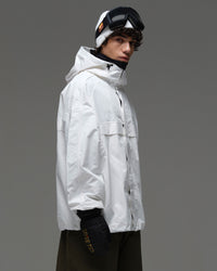 Side view of a man wearing the white NOBADAY Pure Free snow jacket with a high collar