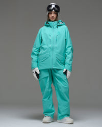 Full-body front view of the NOBADAY Women's ArcticStorm Freeride 3L blue waterproof snow jacket with matching snow pants