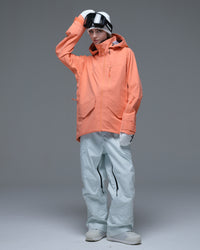 Full-body view of the coral orange Nobaday Women’s ArcticStorm Freeride Zip-Up 3L Snow Jacket featuring flap pockets and an adjustable hood