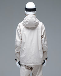 Back view of the NOBADAY Women's Baggy Insulated beige snow jacket showing its protective hood and loose-fitting silhouette