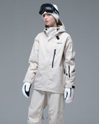 Half-body pose of a woman wearing the NOBADAY Women's Baggy Insulated beige snow jacket with an adjustable hood and waterproof chest pocket