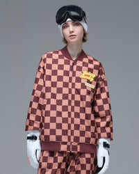 Front view of the brown and pink plaid Nobaday Women’s Baseball Insulated Snow Jacket featuring a baseball collar and embroidered chest patches