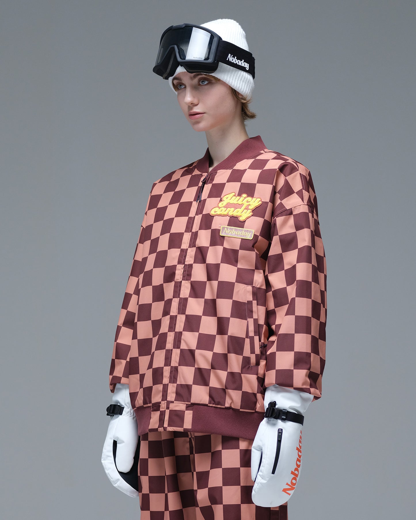 Side view of the brown and pink plaid Nobaday Women’s Baseball Insulated Snow Jacket with embroidered chest patches