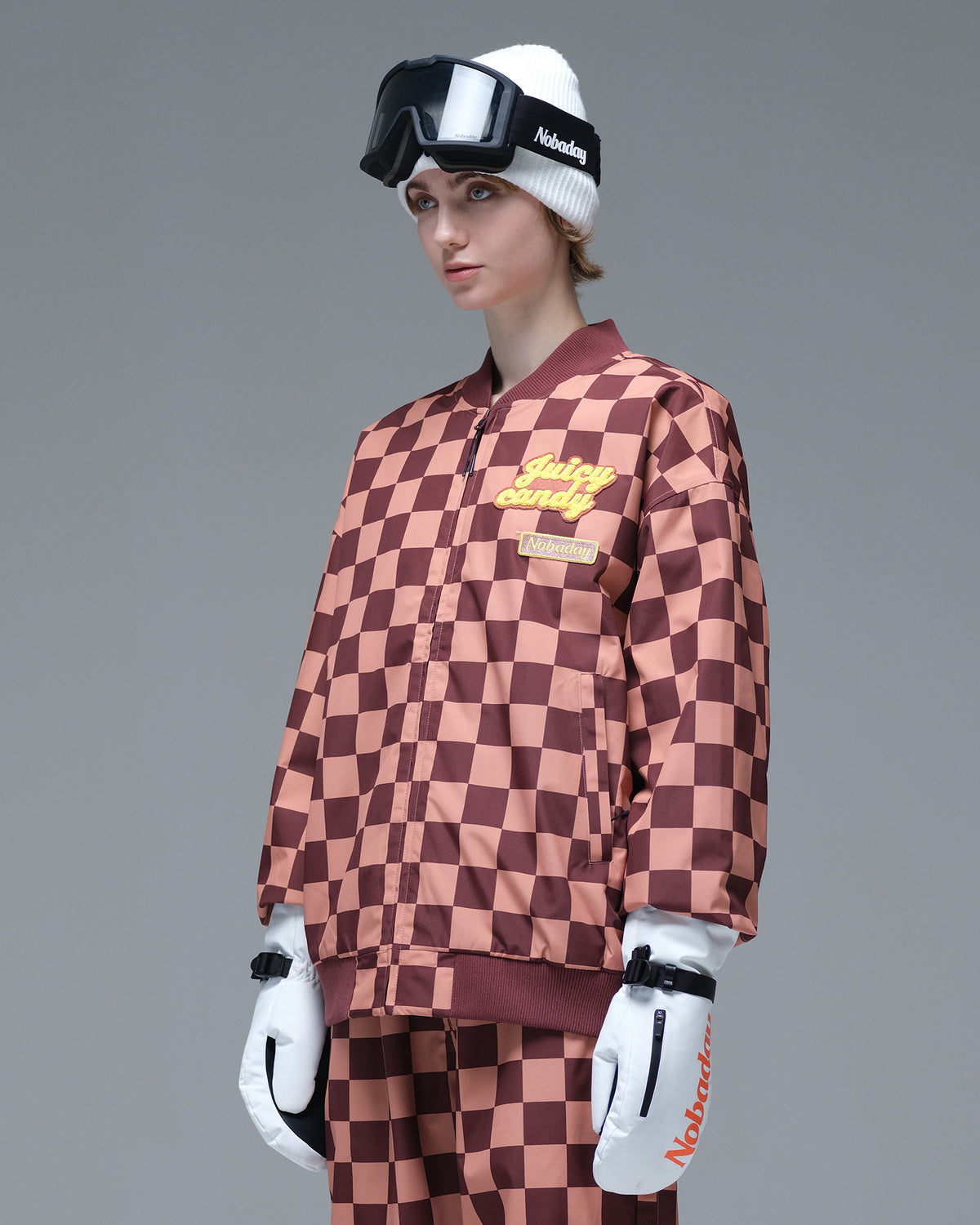 Side view of the brown and pink plaid Nobaday Women’s Baseball Insulated Snow Jacket with embroidered chest patches