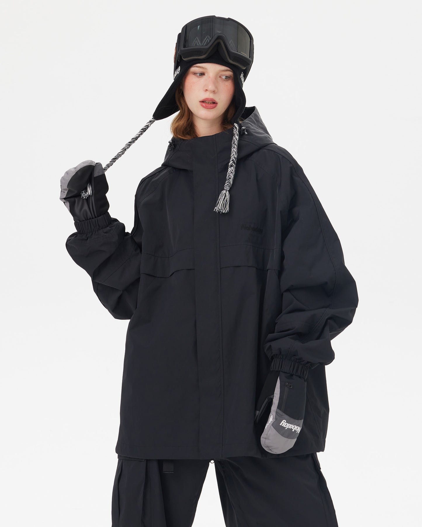 snow-jacket-front-view.jpgFront view of Nobaday women's black waterproof snow jacket with high collar, storm flap, oversized sleeves, and relaxed snowboard fit