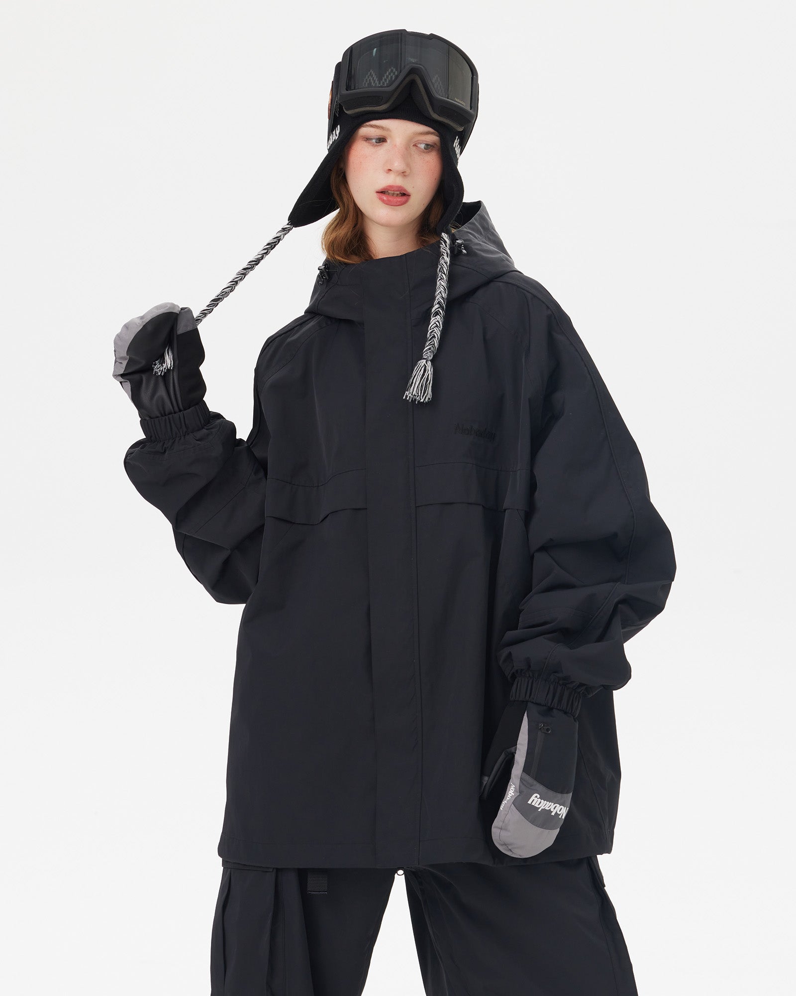 snow-jacket-front-view.jpgFront view of Nobaday women's black waterproof snow jacket with high collar, storm flap, oversized sleeves, and relaxed snowboard fit