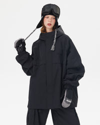 snow-jacket-front-view.jpgFront view of Nobaday women's black waterproof snow jacket with high collar, storm flap, oversized sleeves, and relaxed snowboard fit