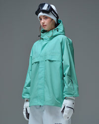 Side view of Nobaday women's blue active snow jacket with adjustable hood, high collar, sleeve pass pocket, and relaxed snowboard fit