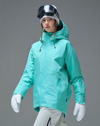 Side view of a woman wearing a Nobaday Blue GORE-TEX snow jacket with zippered pockets