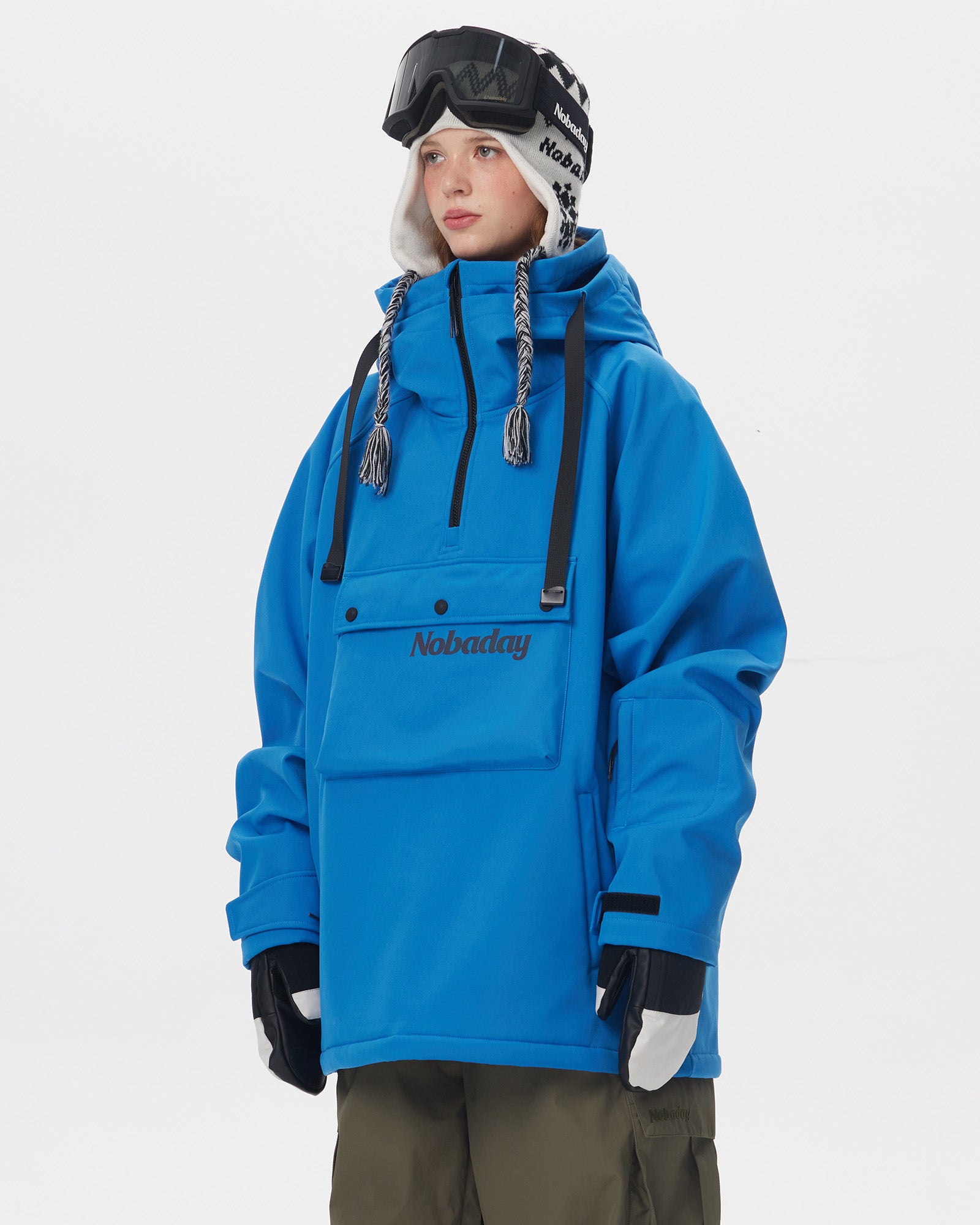 Side view of Nobaday Women's Pure Free blue waterproof fleece hoodie with front pocket, sleeve detail, high collar, and relaxed fit