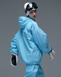 Three-quarter back view of the NOBADAY Women's Dawn OG Insulated ice blue snow jacket showing the hood and reflective sleeve details