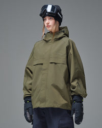 Side view of Nobaday Women's Pure Free Cargo green snow jacket with high collar, sleeve pocket, and loose snowboard fit