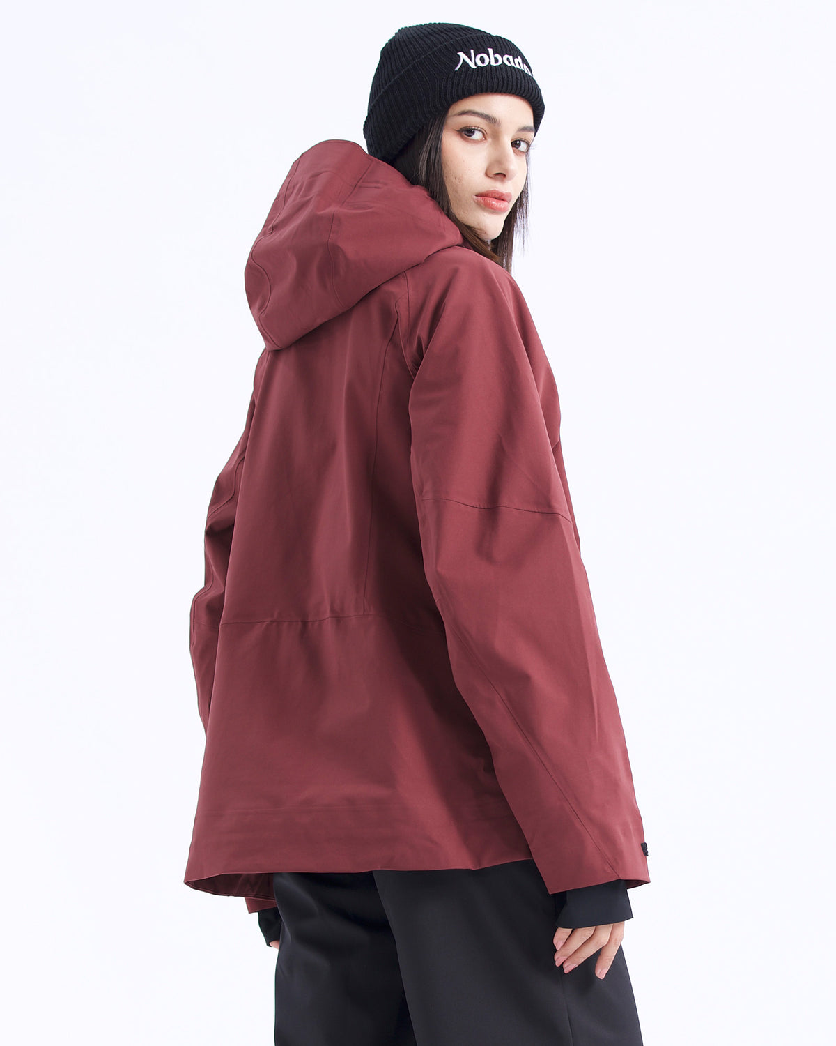 Back view of the NOBADAY Women's Juicy 3L dark red waterproof snow jacket showing the protective hood and clean rear design