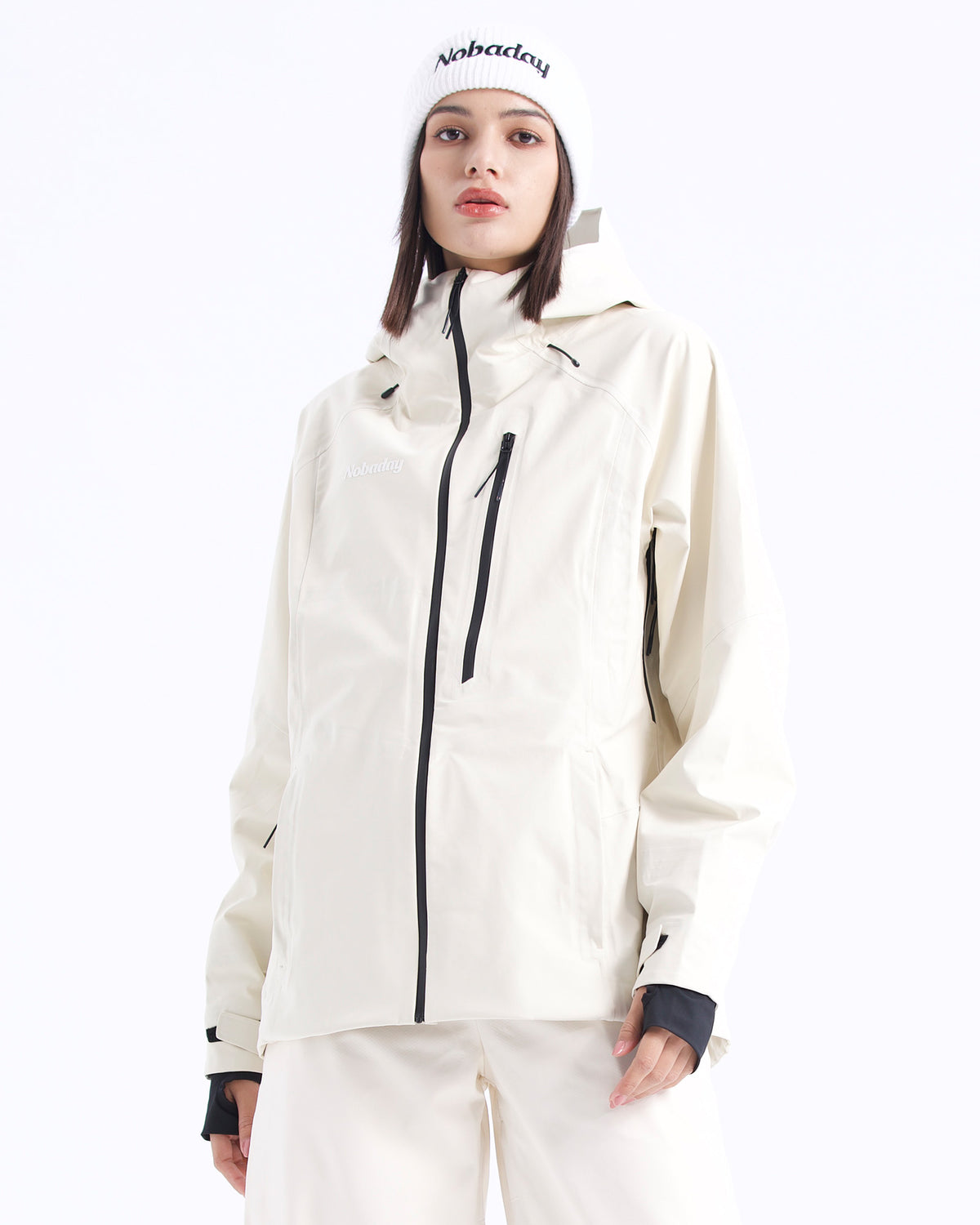 Front view of the NOBADAY Women's Juicy 3L white snow jacket with waterproof black zippers, adjustable hood, and Velcro cuffs