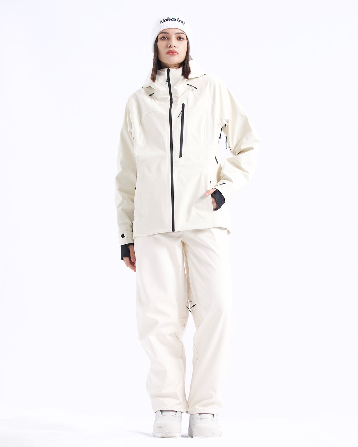 Full-body front view of the NOBADAY Women's Juicy 3L white waterproof snow jacket with matching snow pants