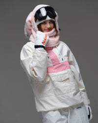 Model wearing the ivory and pink Nobaday Women’s Juicy Candy Retro Snow Jacket with front utility pockets