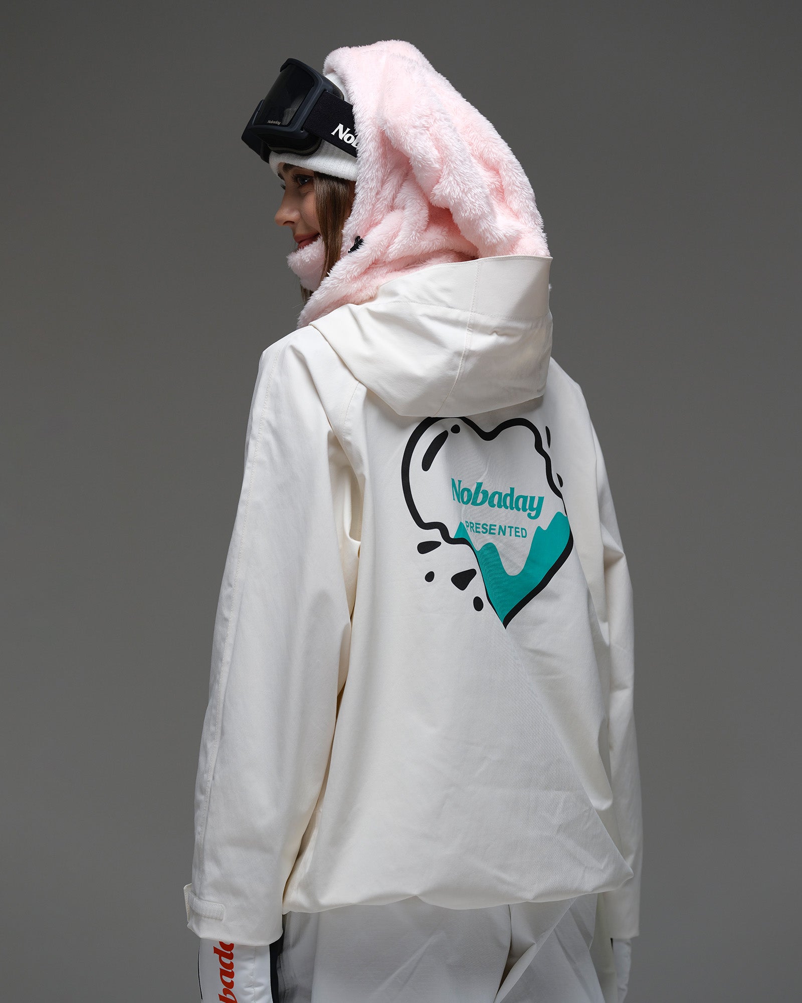 Back view of the Nobaday Women’s Juicy Candy Retro Snow Jacket featuring a large turquoise and black graphic