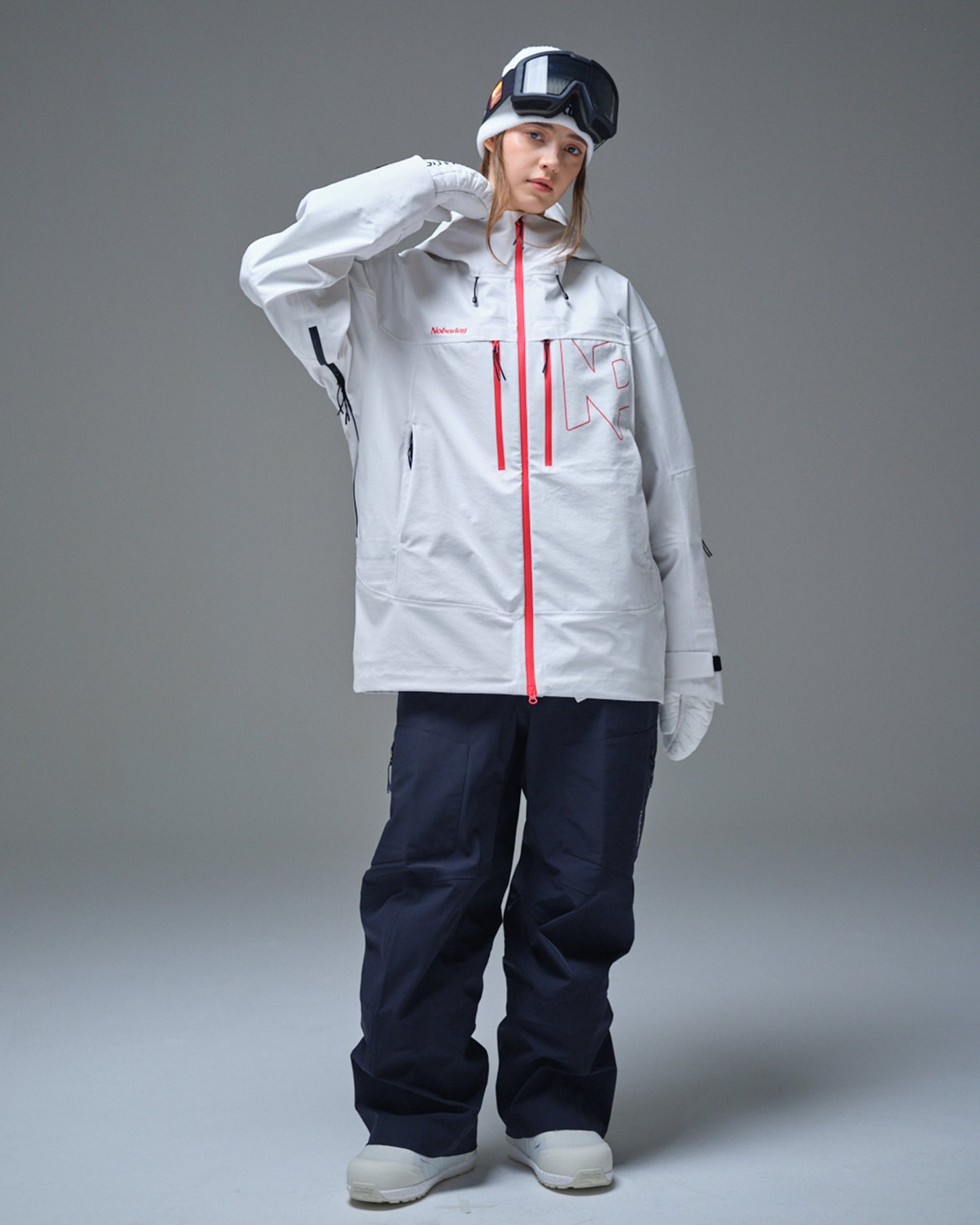 Full-body front view of a woman wearing the Nobaday Pure Free Apex 3L waterproof breathable snow jacket in white
