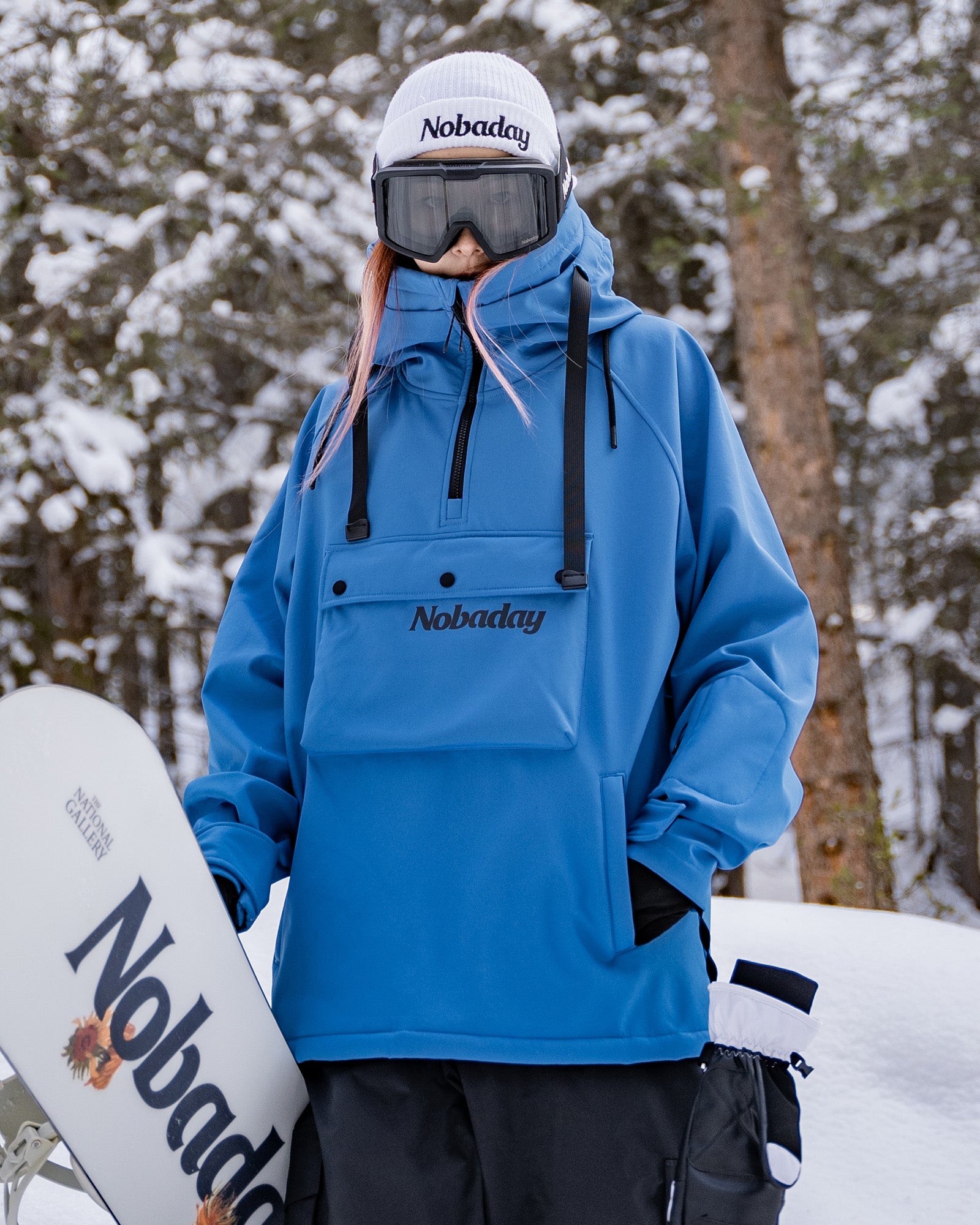 Front detail of Nobaday Women's Pure Free blue softshell fleece snow hoodie with chest pocket, half zip, and high collar