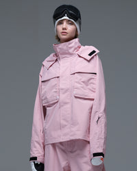 Front view of the pink Nobaday Women’s Pure Free Drift Snow Jacket featuring a high collar, flap pockets and adjustable cuffs