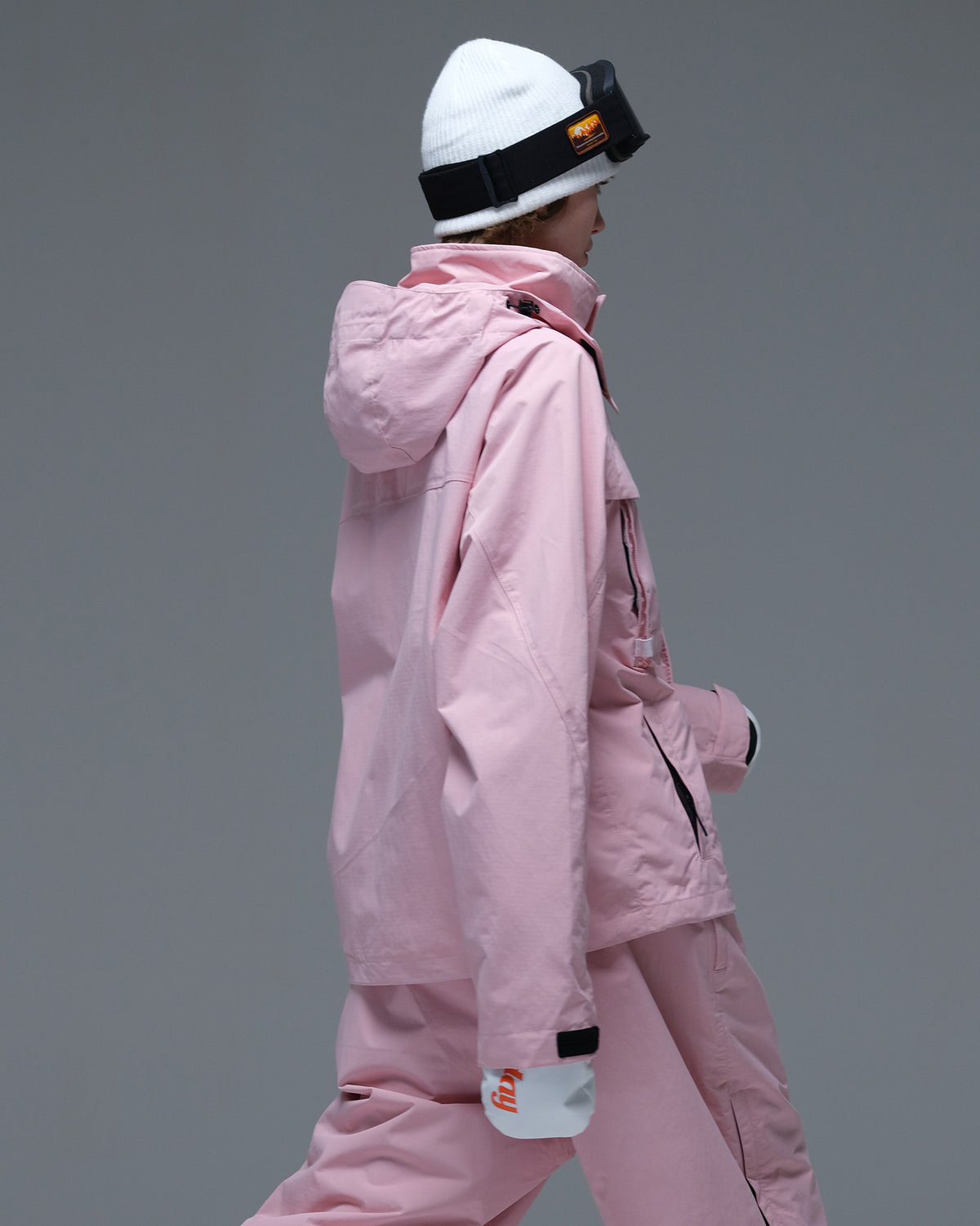 Back view of the pink Nobaday Women’s Pure Free Drift Snow Jacket showing its relaxed silhouette and detachable hood