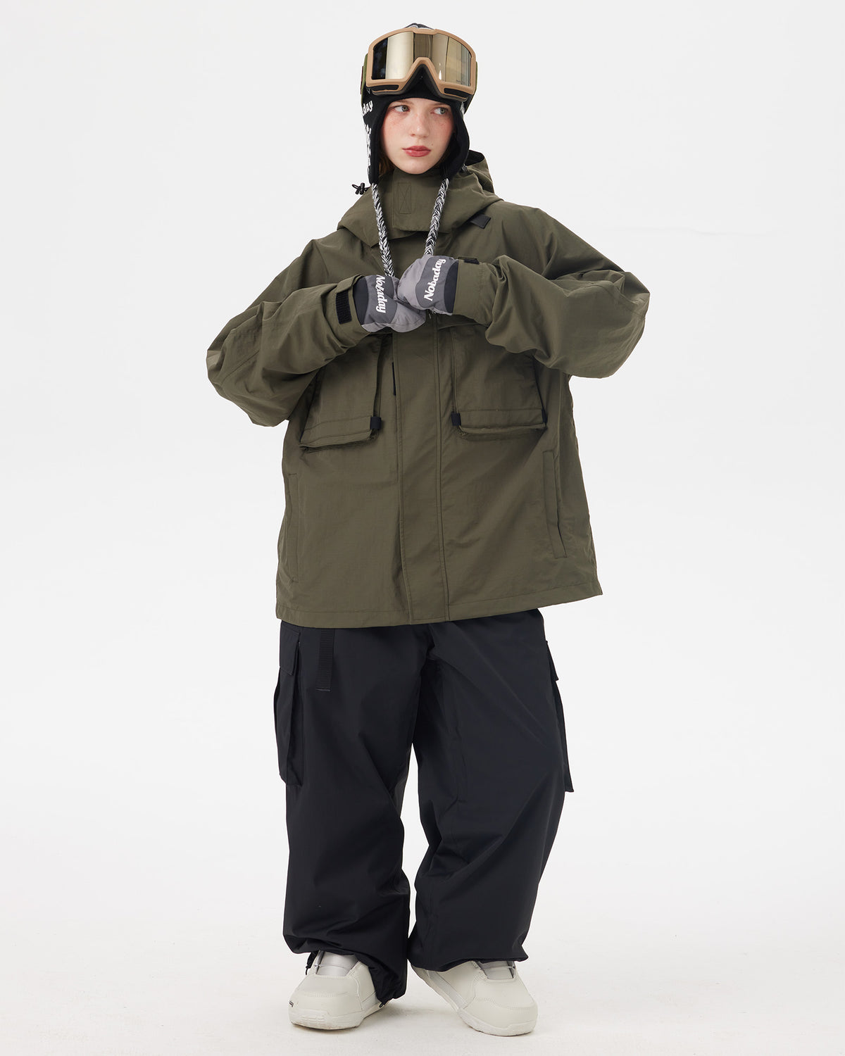 Full-body front view of the NOBADAY Women's Pure Free Freestyle dark green waterproof snow jacket with an oversized fit