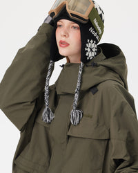 Close-up of the NOBADAY Women's Pure Free Freestyle dark green snow jacket showing the adjustable hood and storm collar