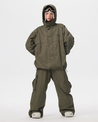 Full body front view of Nobaday Women's Pure Free green snow jacket with matching snow pants, oversized fit, and adjustable hood