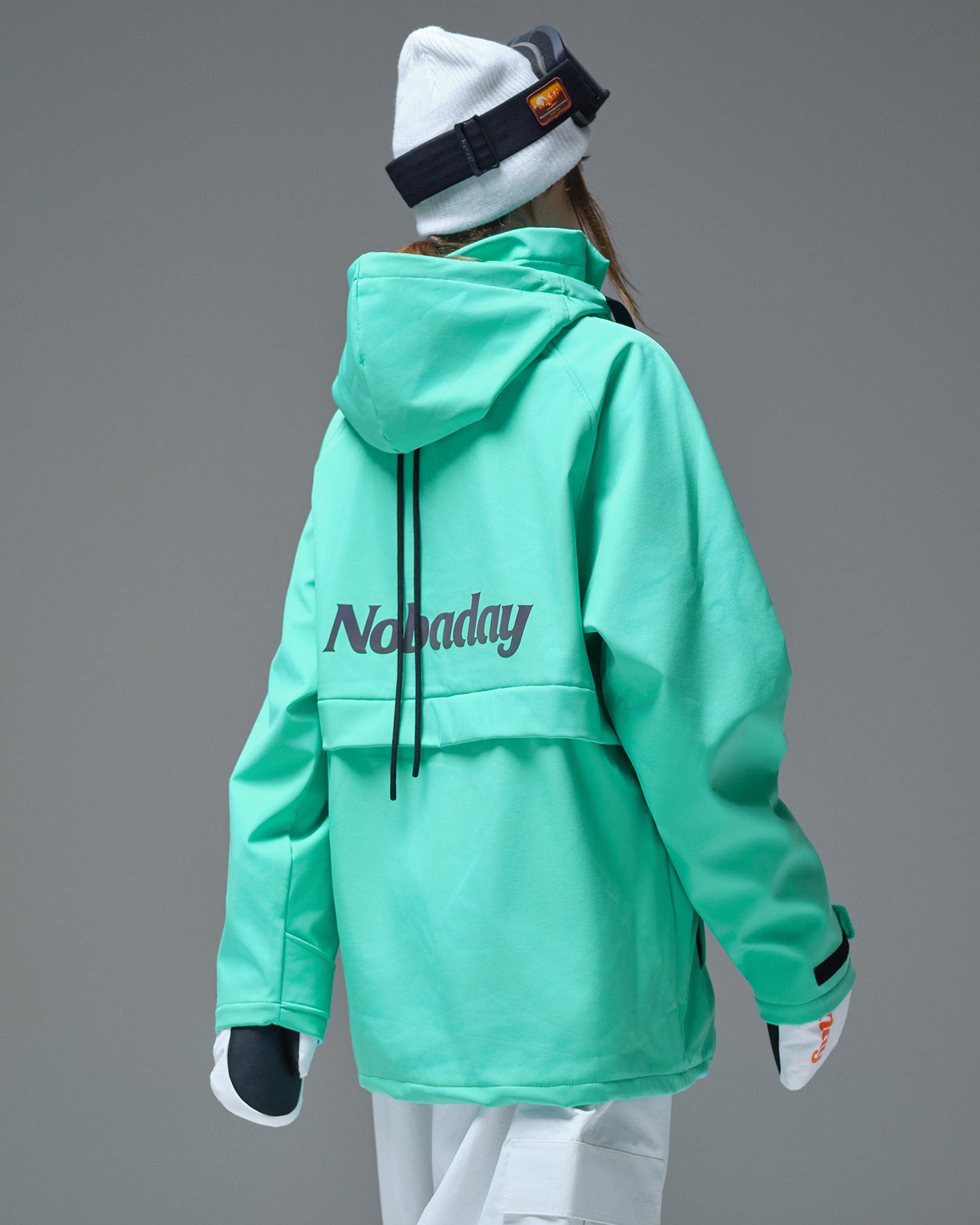 Back view of the Nobaday Women’s Pure Free Softshell Fleece Hoodie with reflective logo