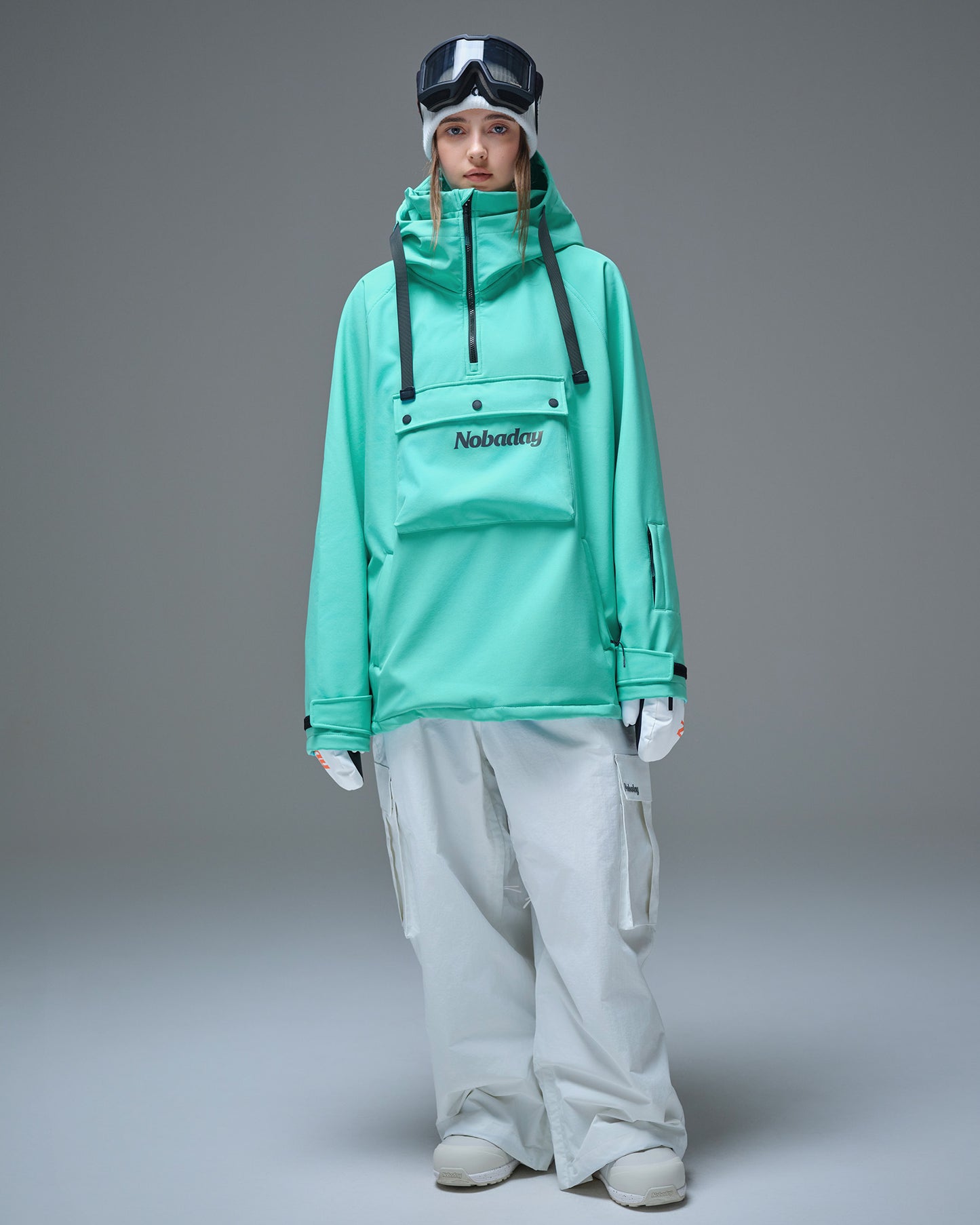 Full-body front view of a model wearing the Nobaday Women’s Pure Free Softshell Fleece Hoodie in Nobaday Blue