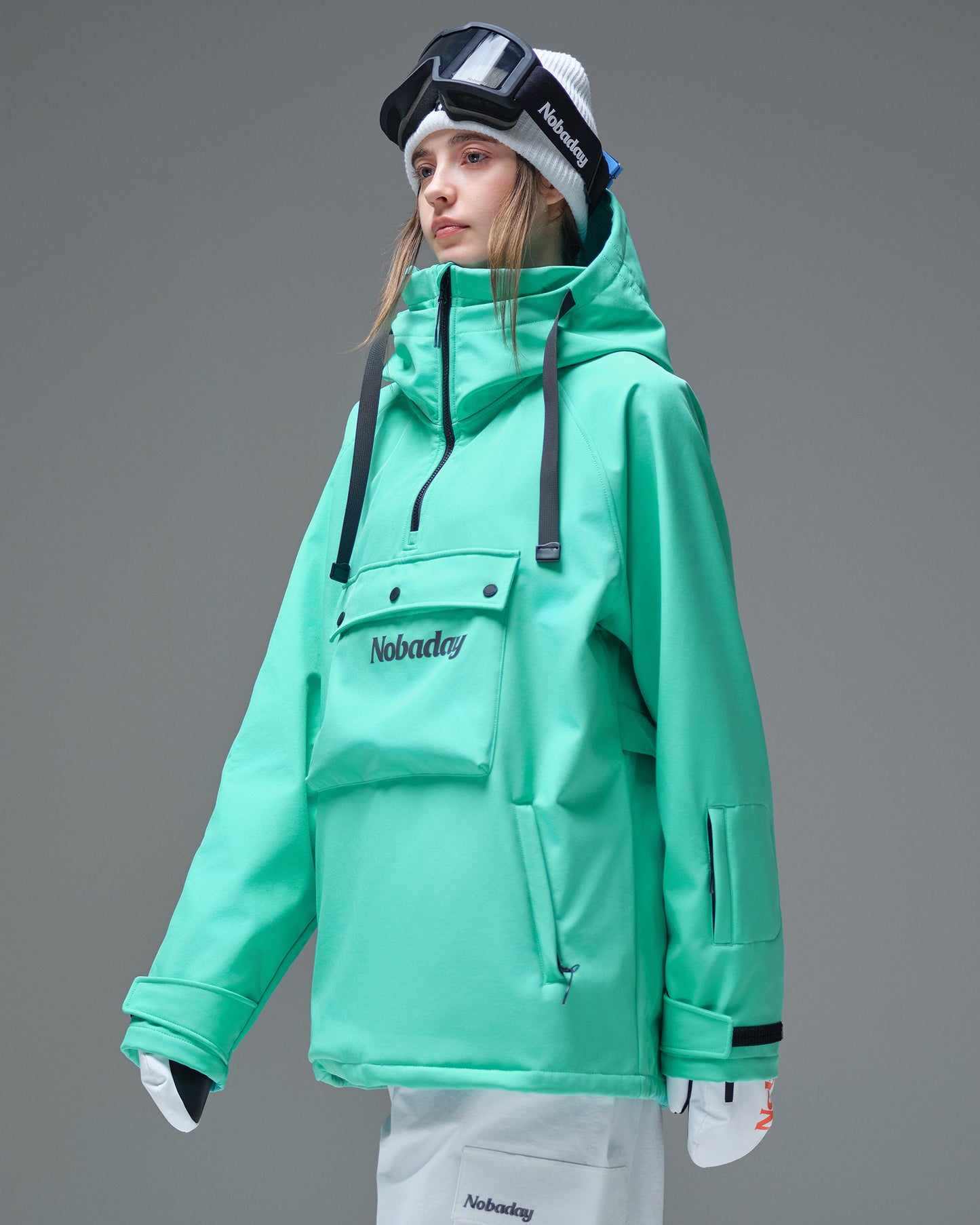 Side view of the Nobaday Women’s Pure Free Softshell Fleece Hoodie in Nobaday Blue
