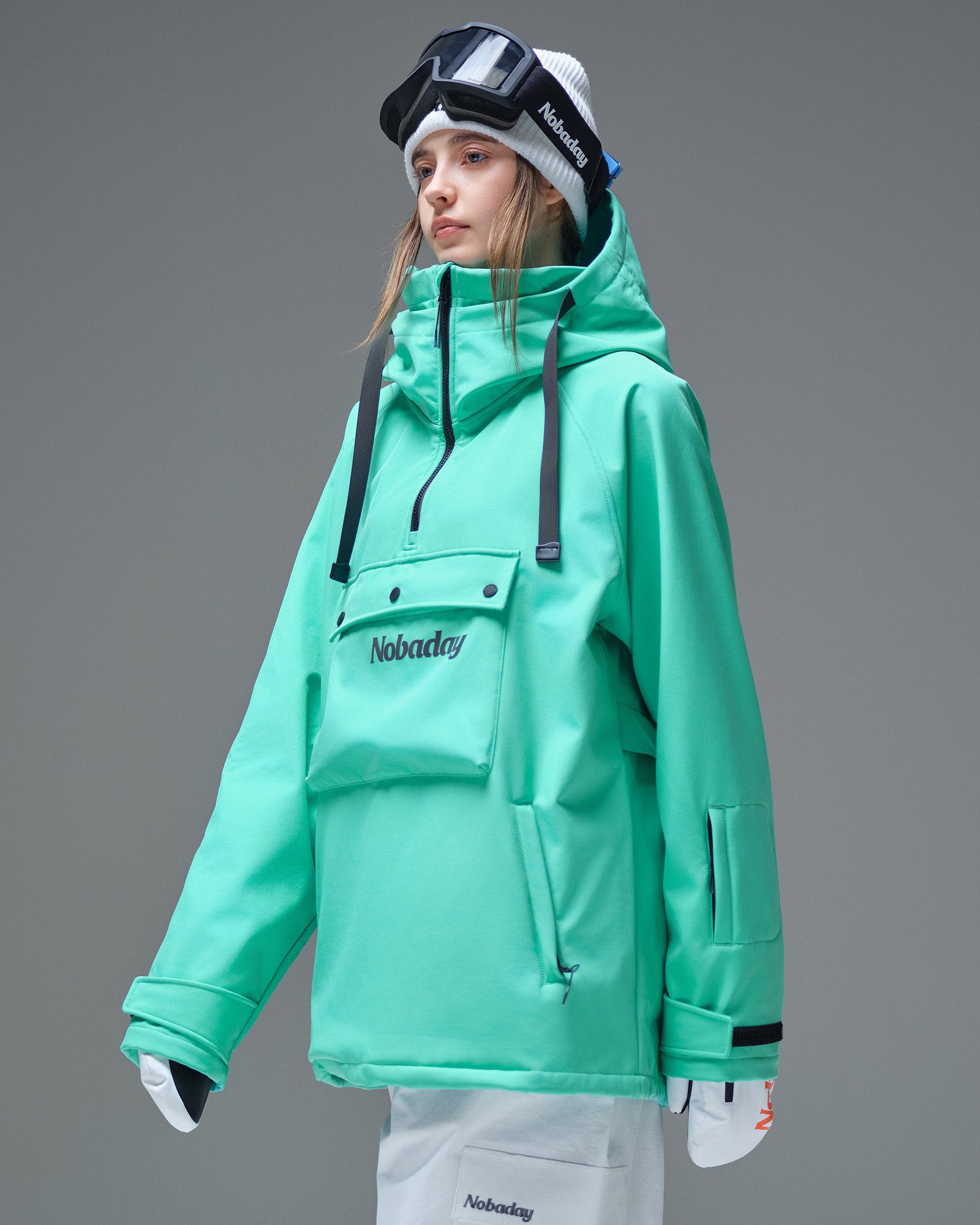 Side view of the Nobaday Women’s Pure Free Softshell Fleece Hoodie in Nobaday Blue