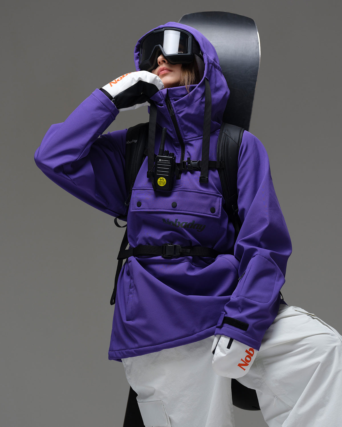 Nobaday Women's Pure Free purple waterproof fleece hoodie styled with snowboard goggles, gloves, and snow gear