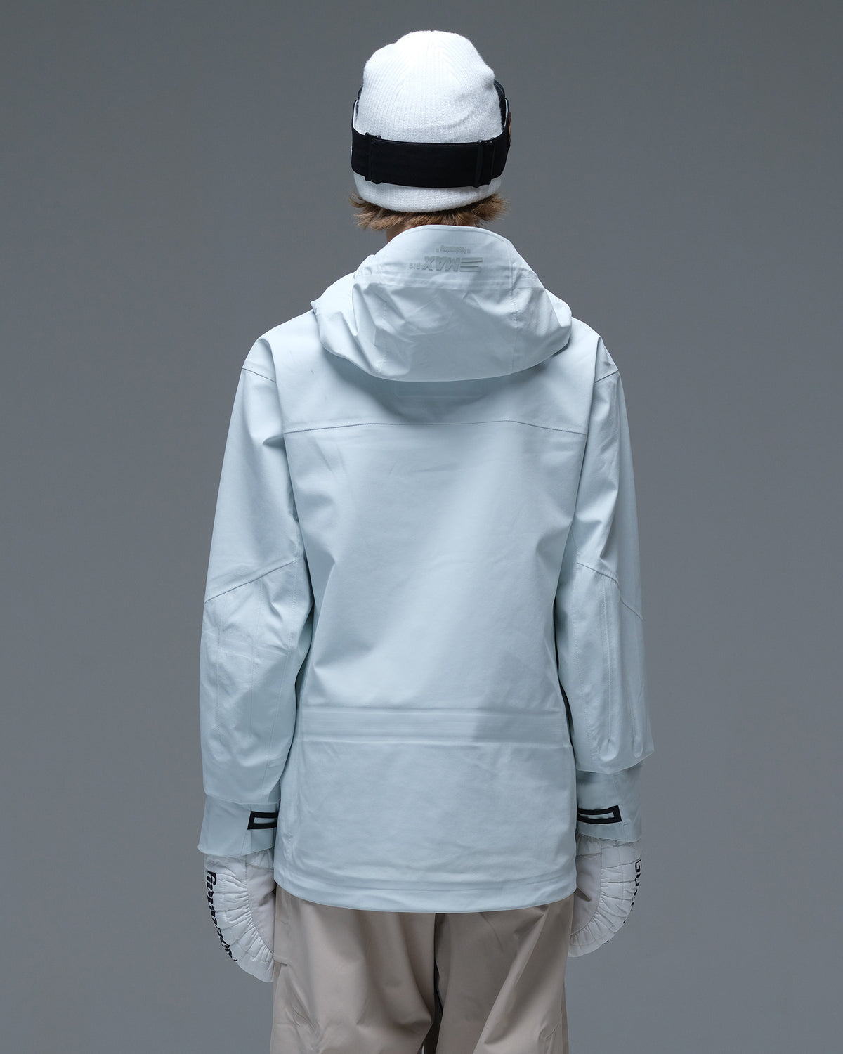 Back view of the ice blue Nobaday Women’s Snowshield Pro 3L Snow Jacket showing its hood and streamlined silhouette