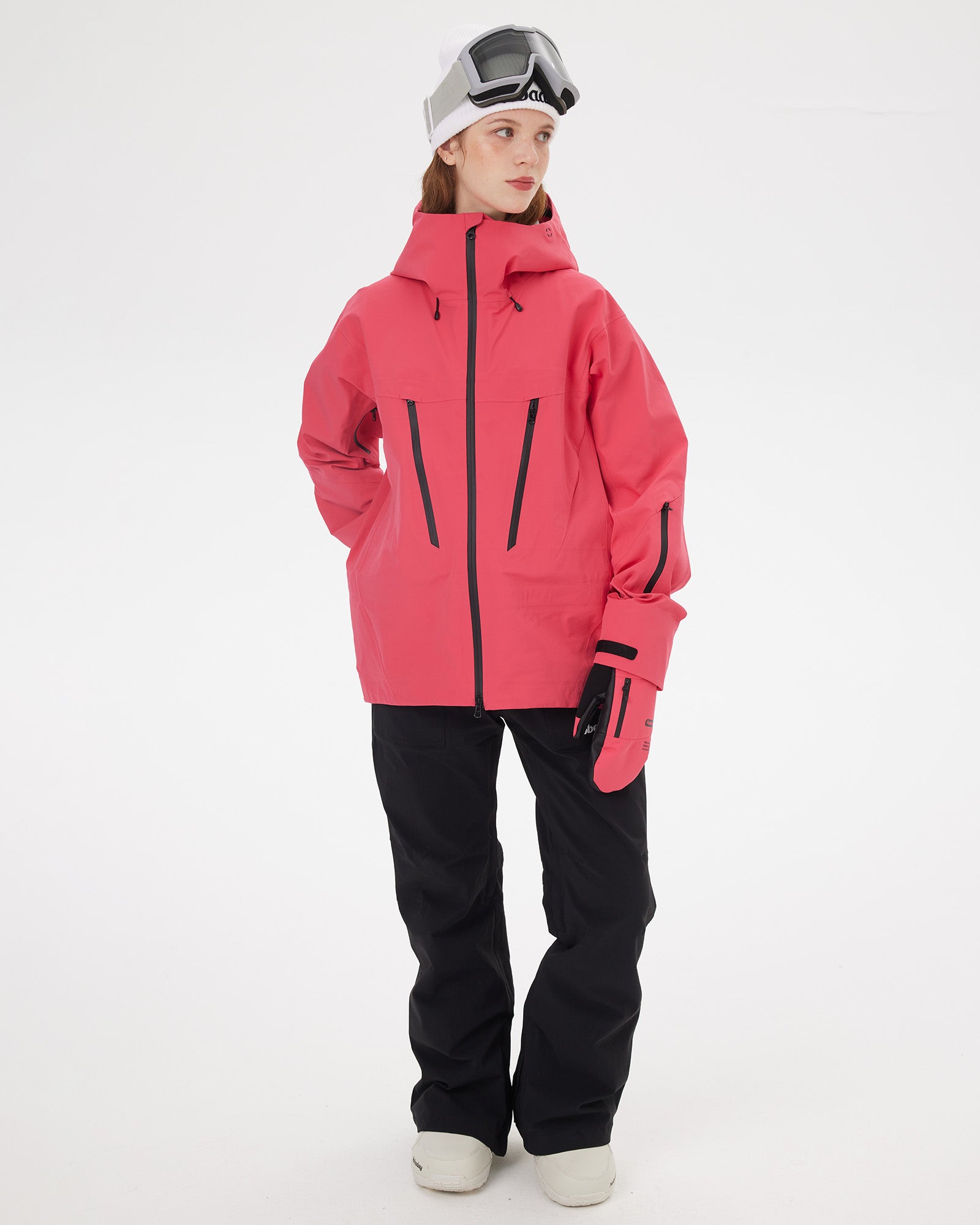 Full-body front view of a woman wearing the NOBADAY Women's SnowShield Pro 3L red waterproof snow jacket with black snow pants