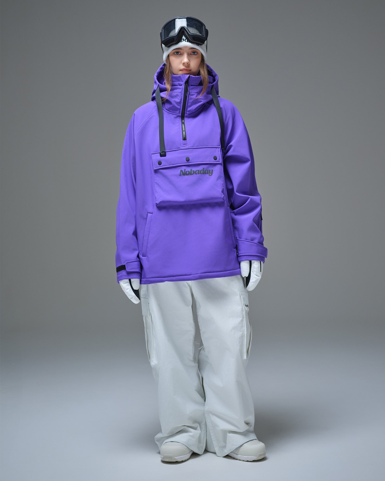 Front view of women's purple waterproof fleece snow hoodie with adjustable hood, chest pocket, and loose fit